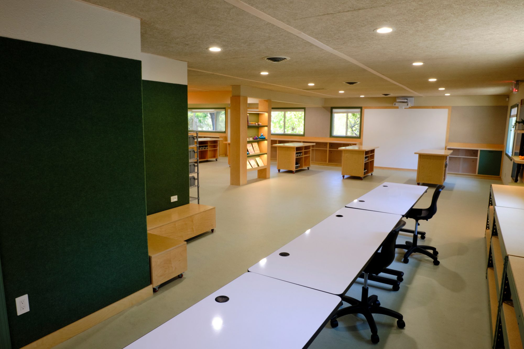 VCC Ranch House, long study tables and green accent wall