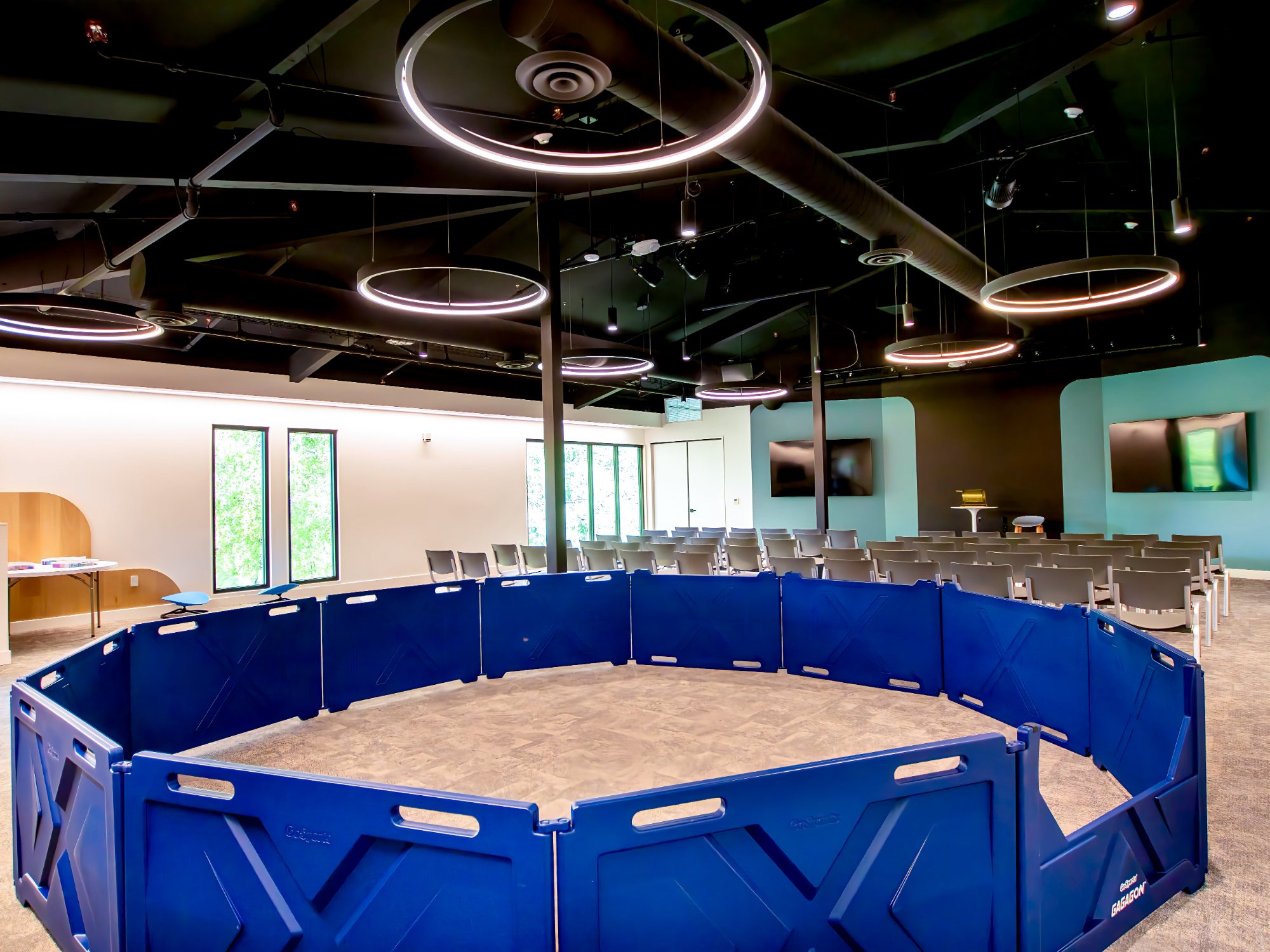 Venture Christian Church Kids Area, large group room with ring lights