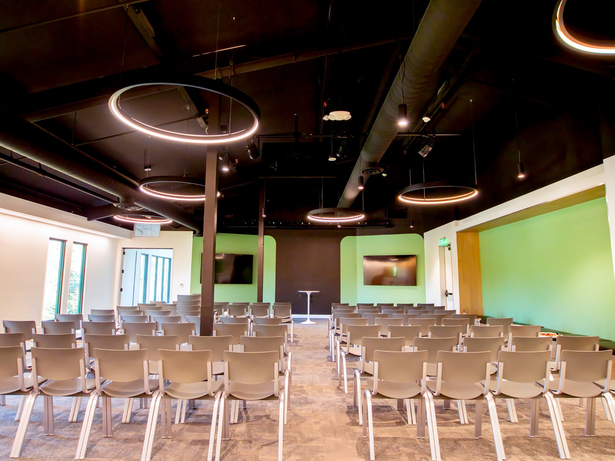 Venture Christian Church Kids Area, auditorium seating with ring lights