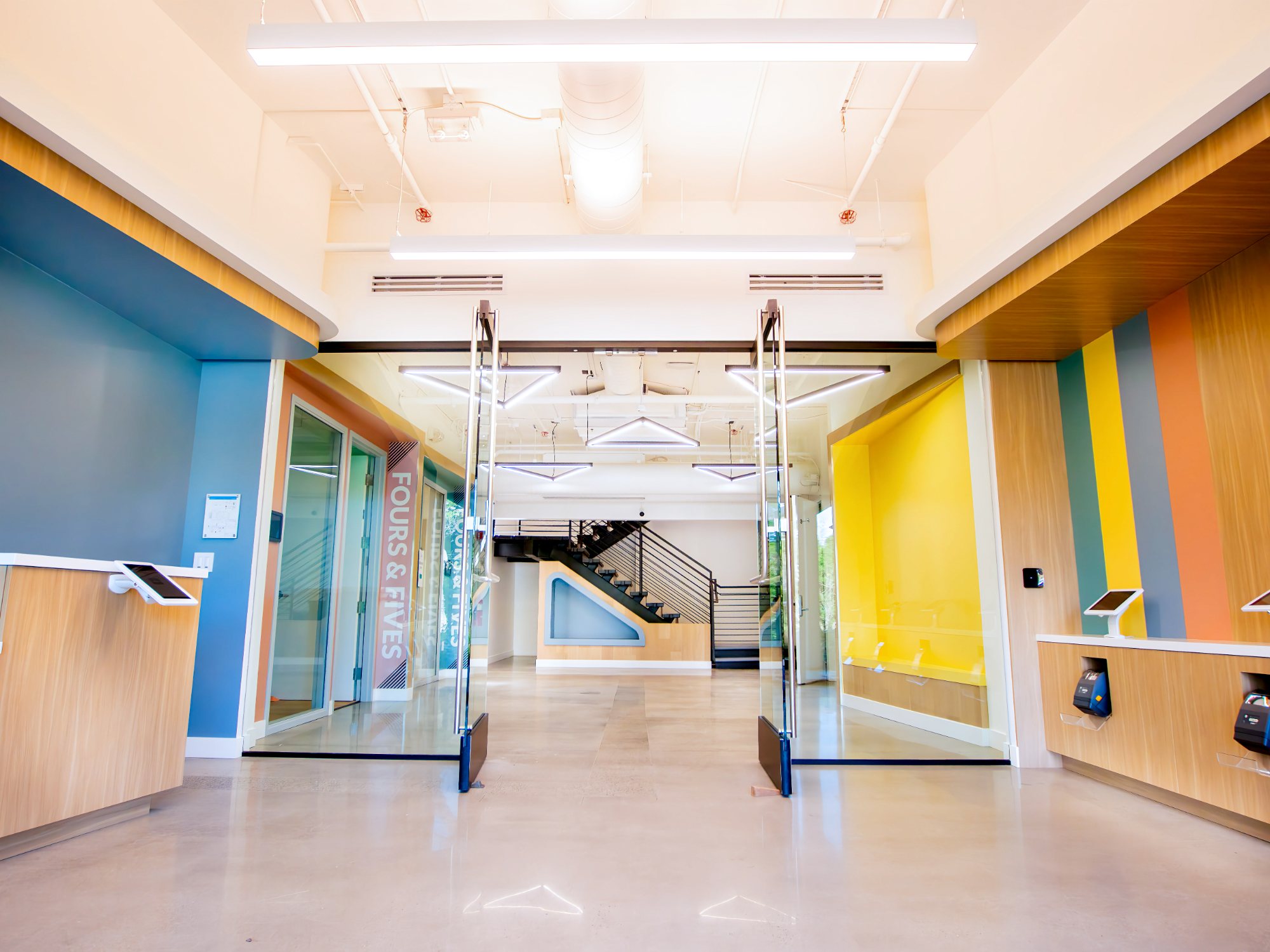 Venture Christian Church Kids Area, colorful corridor with wood paneling