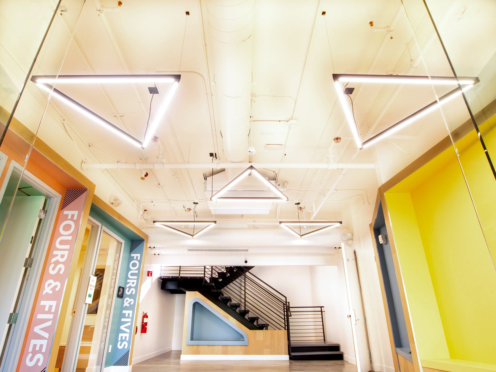 Venture Christian Church Kids Area, lobby with skylight and staircase